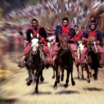 Horse riders racing in All Saints Day in Todos Santos Cuchumatan