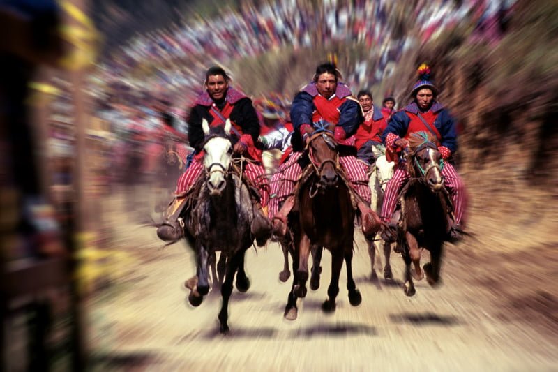 Horse riders racing in All Saints Day in Todos Santos Cuchumatan