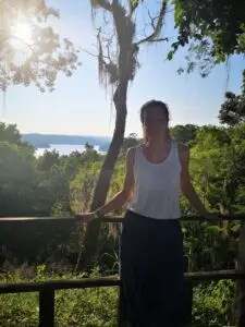 Volunteer standing against a nature backdrop in Guatemala