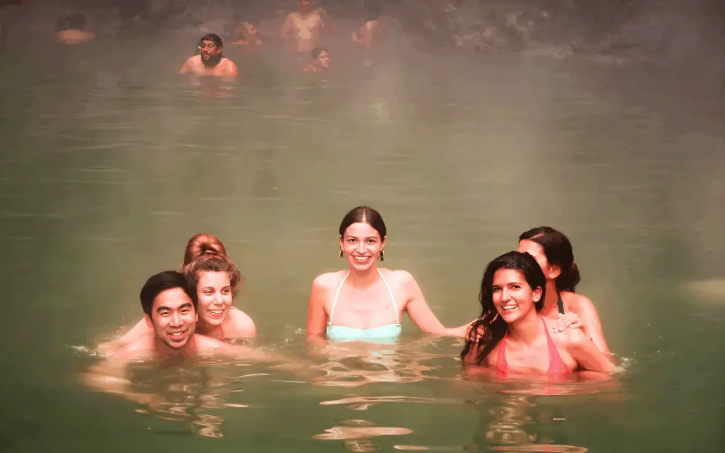 Travellers enjoying hot springs in Guatemala